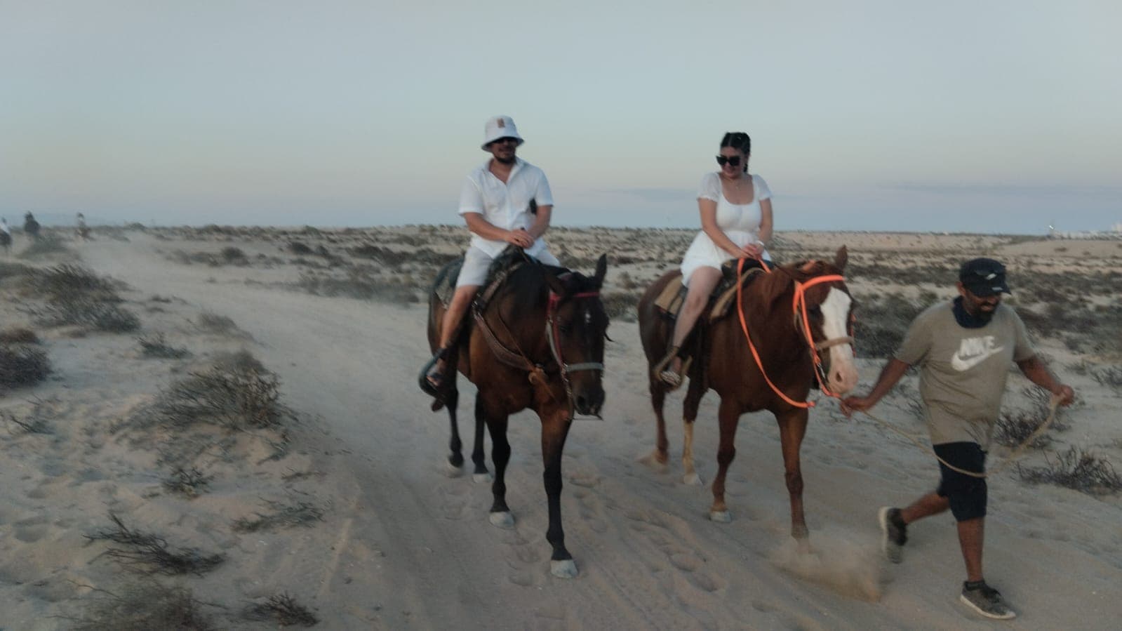 Couple horseback riding guided tour
